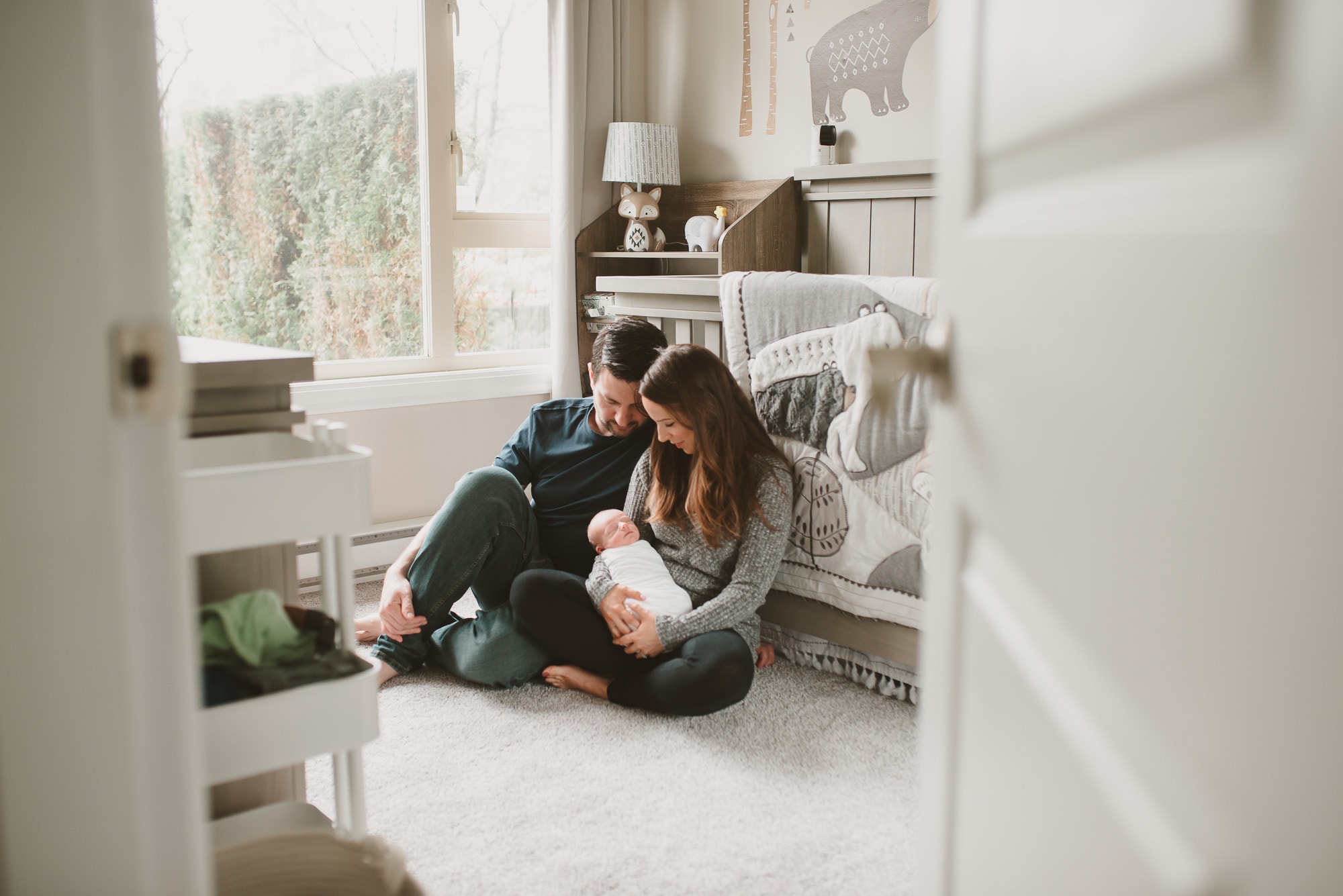 young couple with newborn captured by vancouver newborn photographer