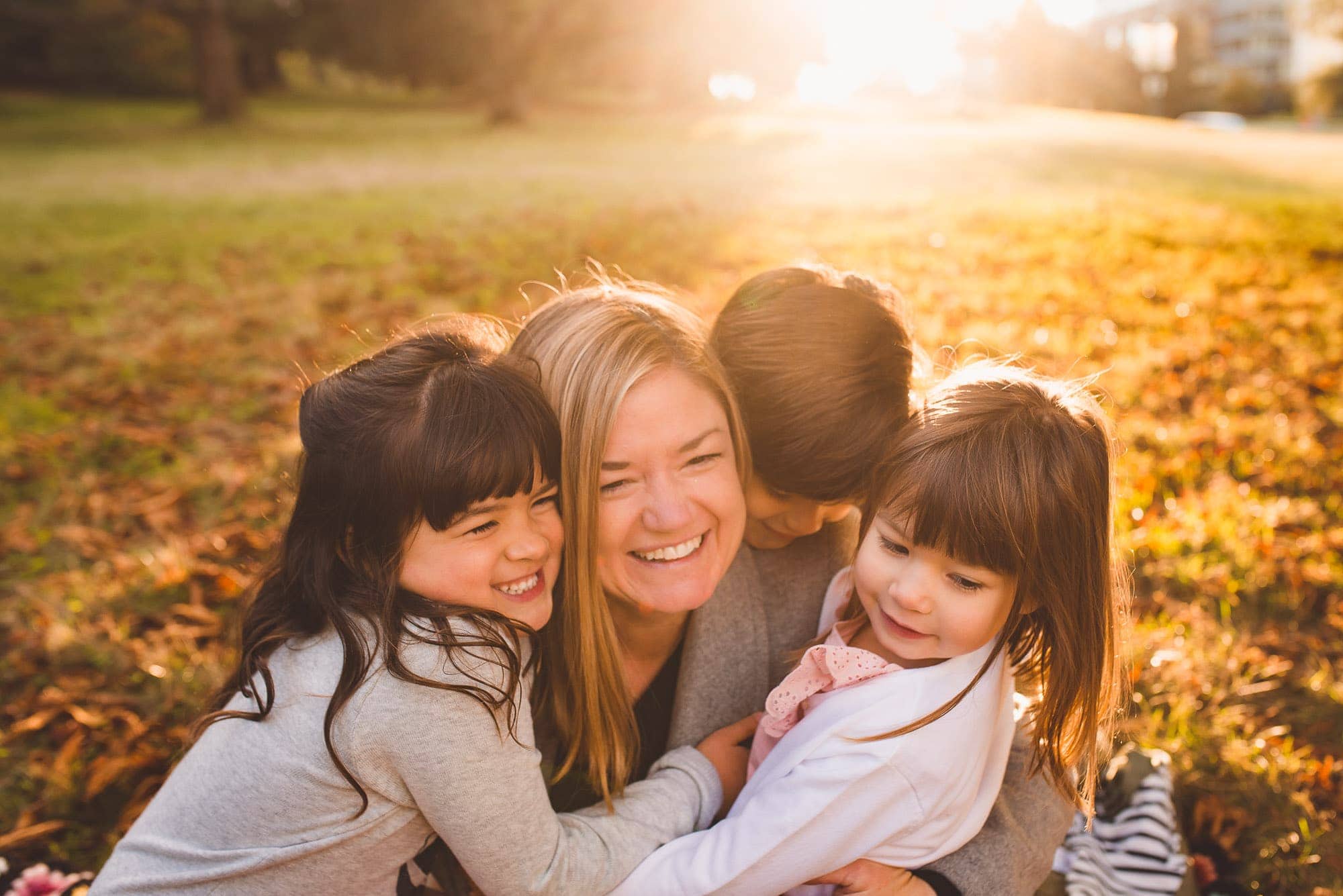 Vancouver Family Photographer captures mom being hugged by all her young kids