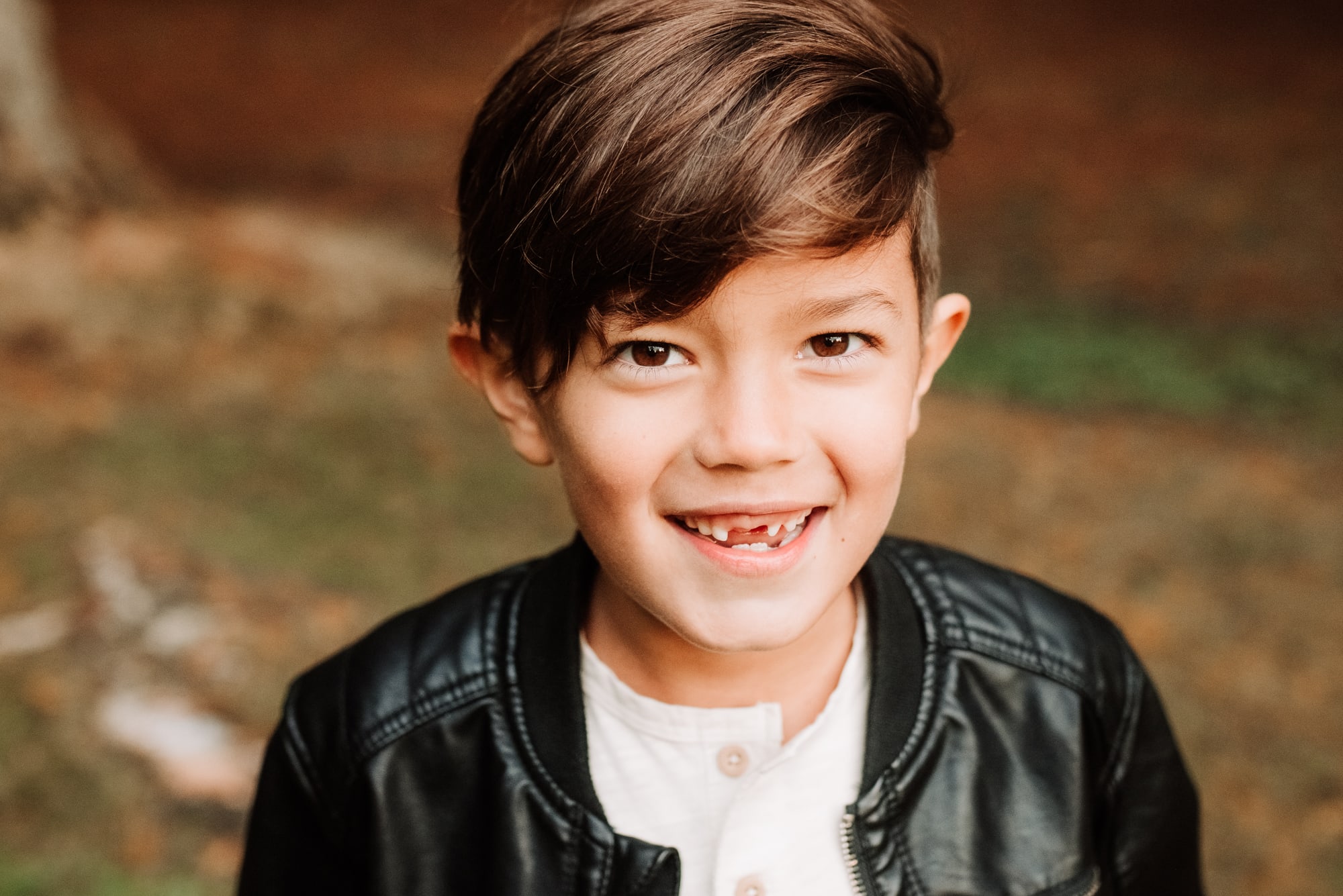 Boy with missing front teeth in Vancouver family session