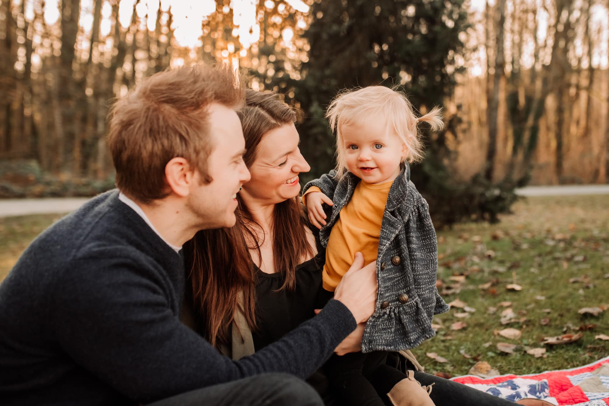 Couple hold daughter in Port Coquitlam photo session with Vancouver Family Photographer
