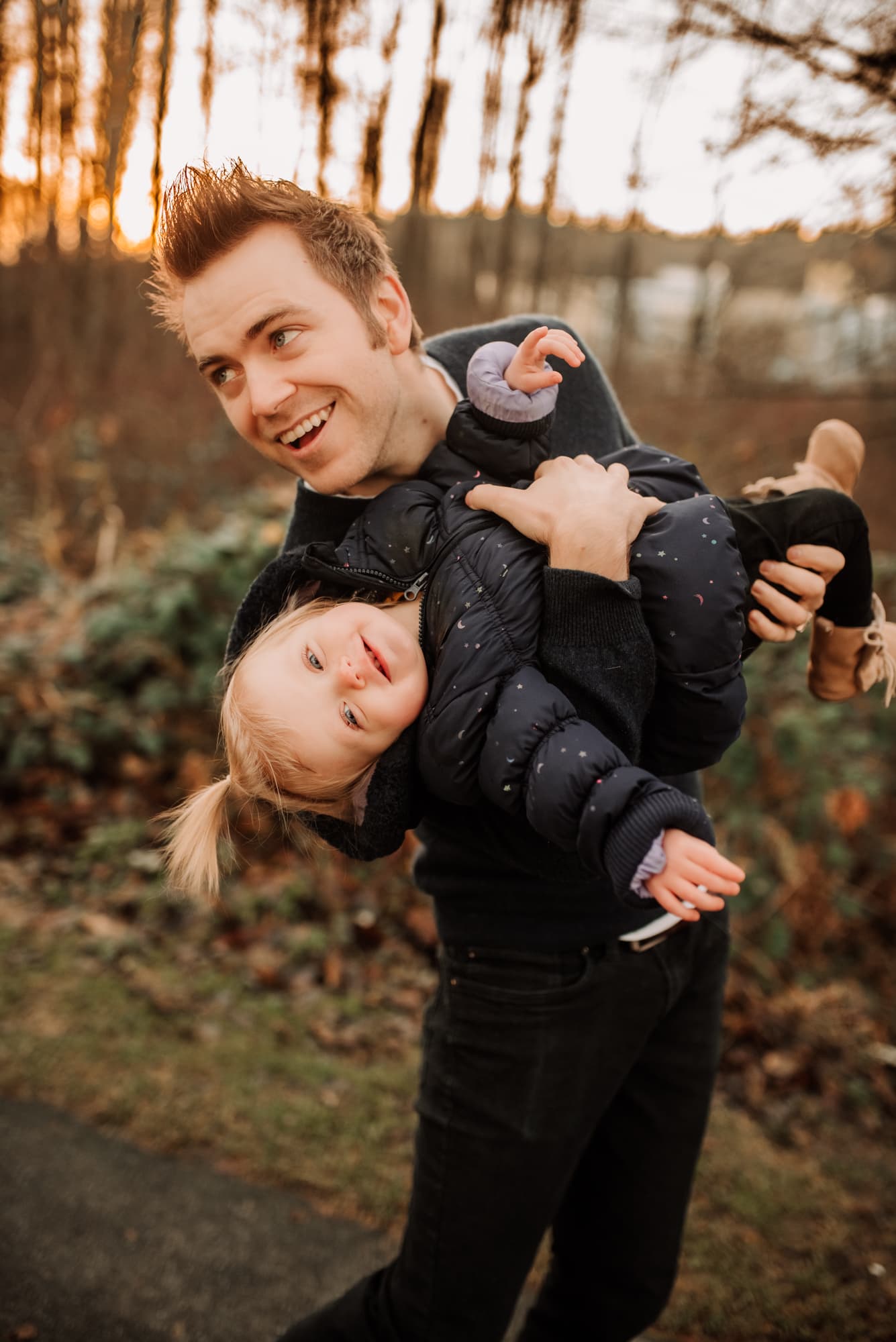 Vancouver Family Photographer captured dad dipping his daughter and laughing