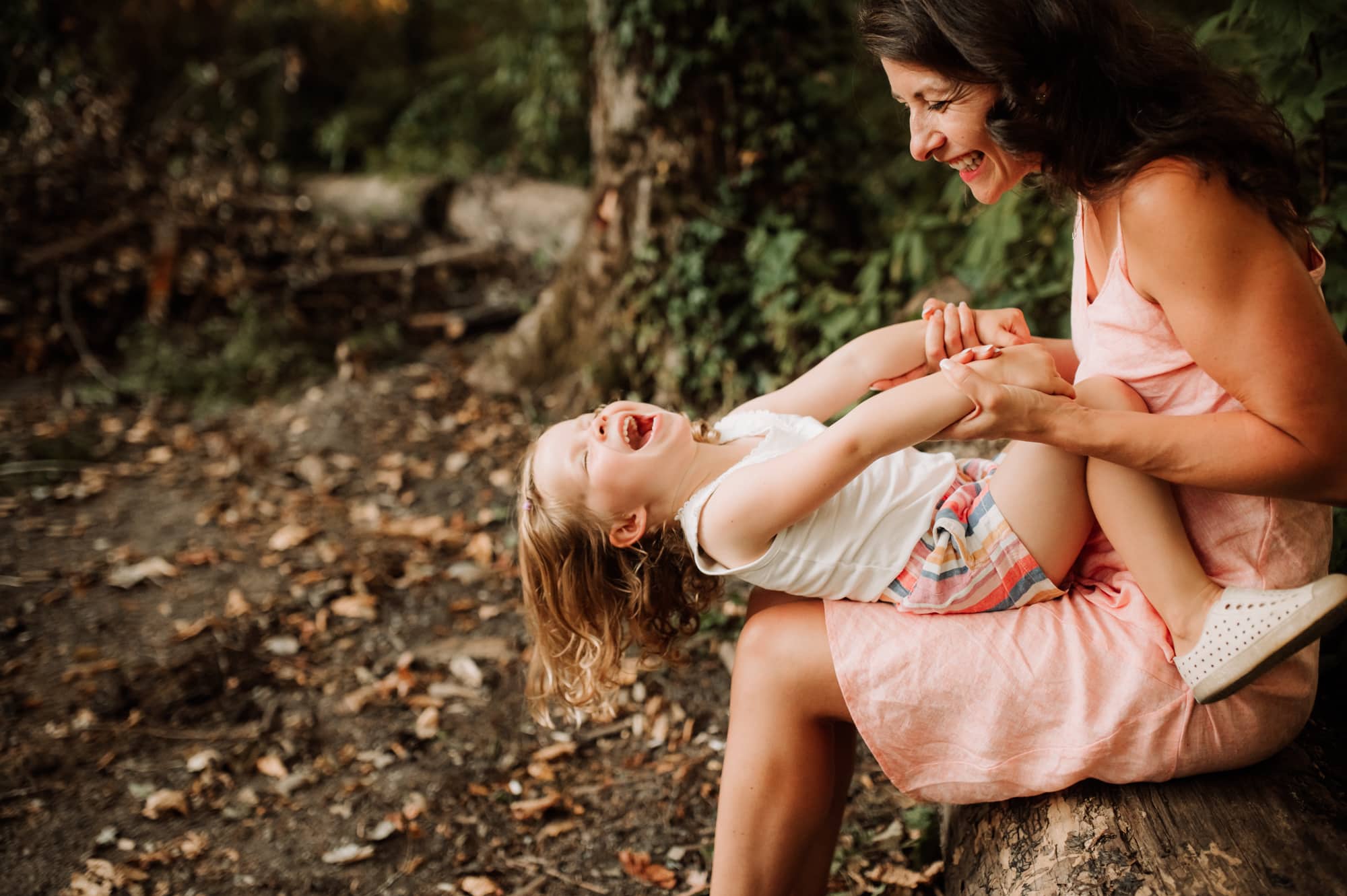Burnaby family photographer catches a mom and daughter sharing a laugh.
